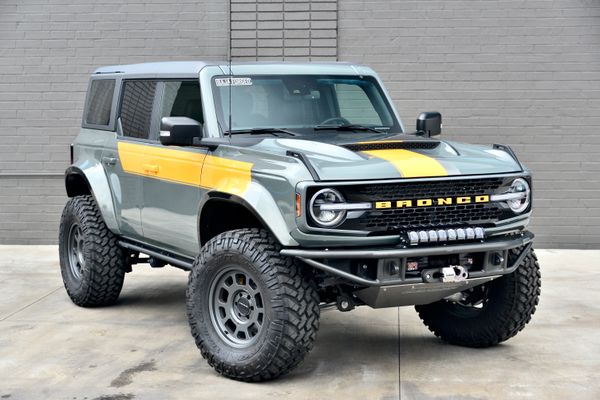 2022 Ford Bronco Wildtrak V6 4-Door, gray with orange accents, previously sold by Sandbox Motors