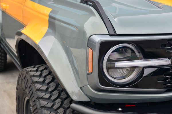 2022 Ford Bronco Wildtrak V6 4-Door, gray with orange accents, previously sold by Sandbox Motors