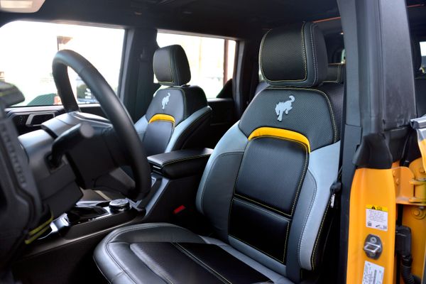 2022 Ford Bronco Wildtrak V6 4-Door, gray with orange accents, previously sold by Sandbox Motors