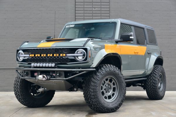 2022 Ford Bronco Wildtrak V6 4-Door, gray with orange accents, previously sold by Sandbox Motors
