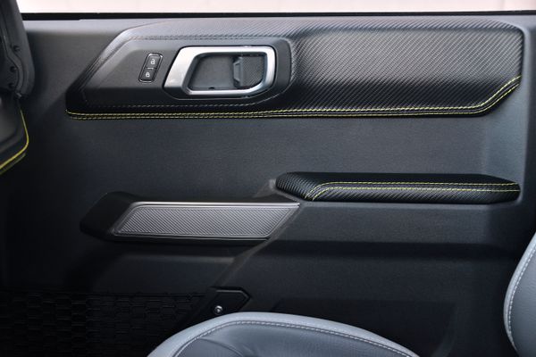 2022 Ford Bronco Wildtrak V6 4-Door, gray with orange accents, previously sold by Sandbox Motors