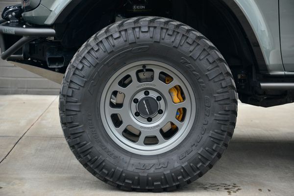 2022 Ford Bronco Wildtrak V6 4-Door, gray with orange accents, previously sold by Sandbox Motors