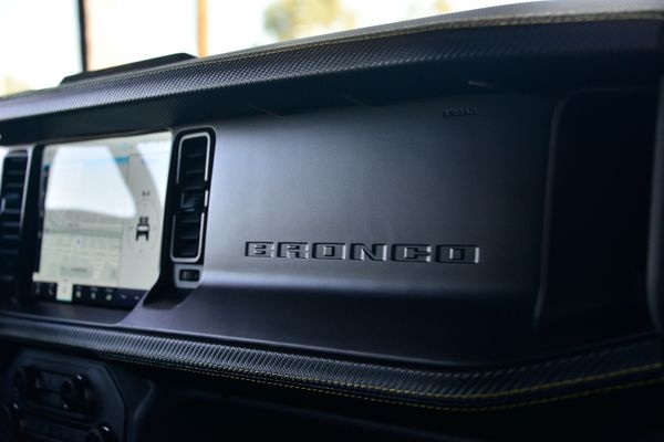 2022 Ford Bronco Wildtrak V6 4-Door, gray with orange accents, previously sold by Sandbox Motors