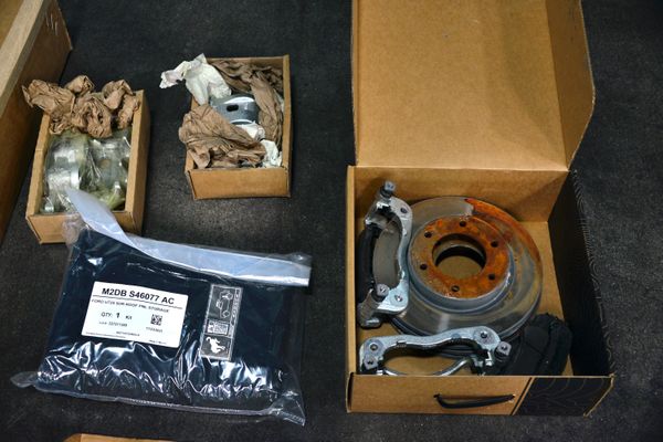 2022 Ford Bronco Wildtrak V6 4-Door, gray with orange accents, previously sold by Sandbox Motors