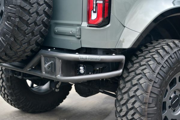 2022 Ford Bronco Wildtrak V6 4-Door, gray with orange accents, previously sold by Sandbox Motors