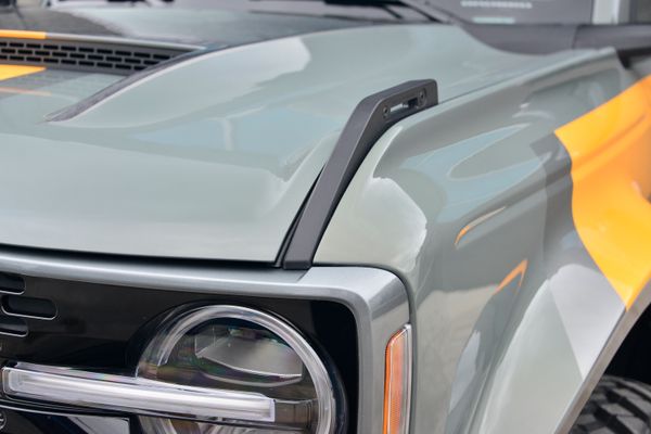 2022 Ford Bronco Wildtrak V6 4-Door, gray with orange accents, previously sold by Sandbox Motors