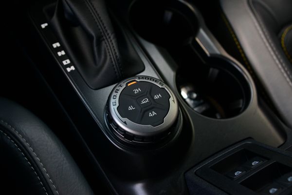 2022 Ford Bronco Wildtrak V6 4-Door, gray with orange accents, previously sold by Sandbox Motors