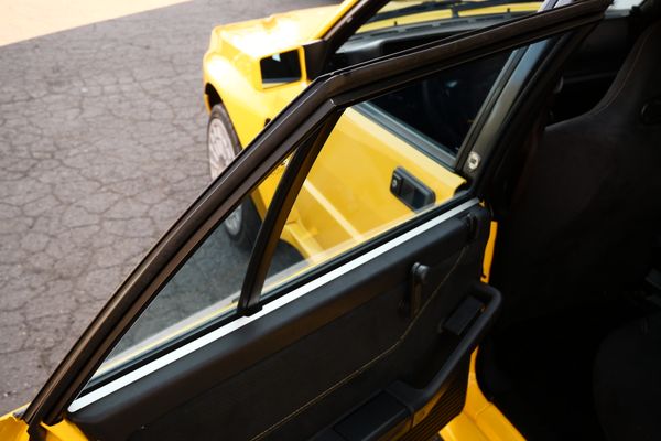 Yellow 1994 Lancia Delta Integrale Evo 2 previously sold by Sandbox Motors