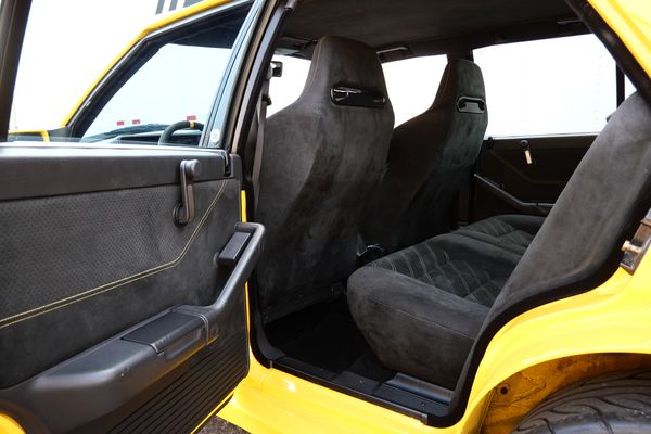 Yellow 1994 Lancia Delta Integrale Evo 2 previously sold by Sandbox Motors