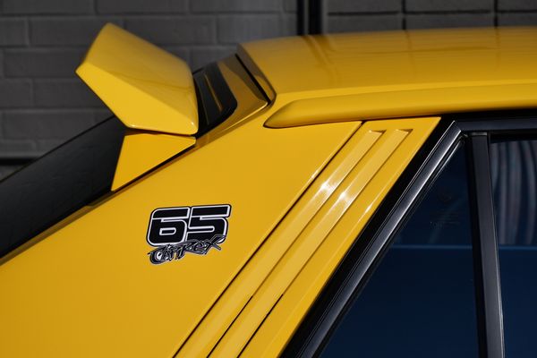 Yellow 1994 Lancia Delta Integrale Evo 2 previously sold by Sandbox Motors