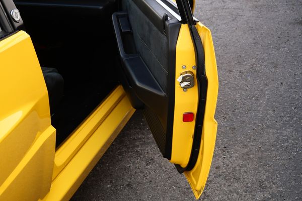Yellow 1994 Lancia Delta Integrale Evo 2 previously sold by Sandbox Motors