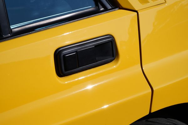 Yellow 1994 Lancia Delta Integrale Evo 2 previously sold by Sandbox Motors