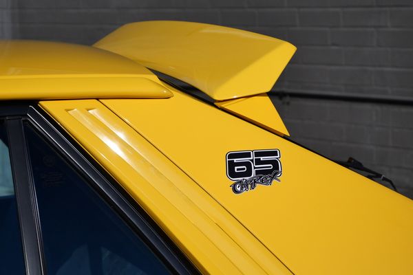 Yellow 1994 Lancia Delta Integrale Evo 2 previously sold by Sandbox Motors
