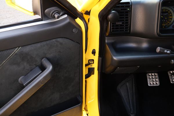 Yellow 1994 Lancia Delta Integrale Evo 2 previously sold by Sandbox Motors