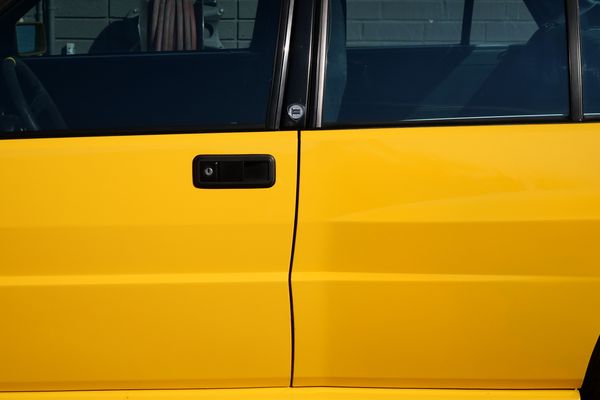 Yellow 1994 Lancia Delta Integrale Evo 2 previously sold by Sandbox Motors