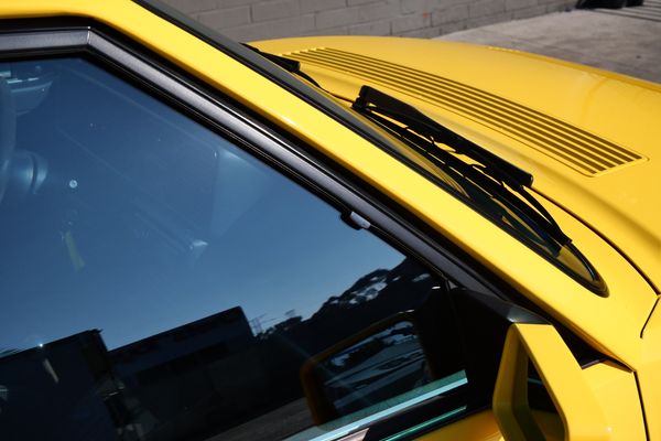 Yellow 1994 Lancia Delta Integrale Evo 2 previously sold by Sandbox Motors