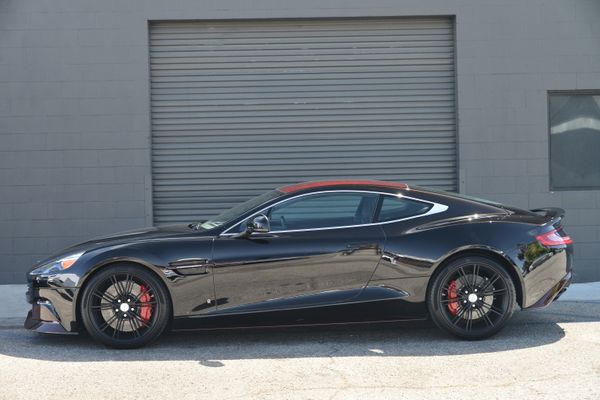 Black and red 2015 Aston Martin Vanquish Q Collection for sale by Sandbox Motors.