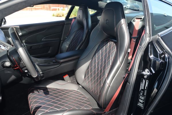 Black and red 2015 Aston Martin Vanquish Q Collection for sale by Sandbox Motors.