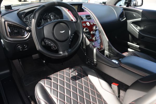 Black and red 2015 Aston Martin Vanquish Q Collection for sale by Sandbox Motors.