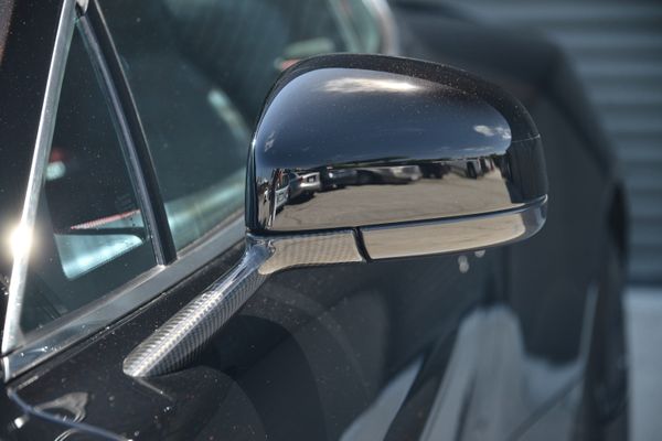 Black and red 2015 Aston Martin Vanquish Q Collection for sale by Sandbox Motors.