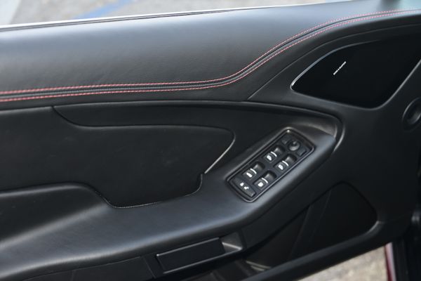 Black and red 2015 Aston Martin Vanquish Q Collection for sale by Sandbox Motors.