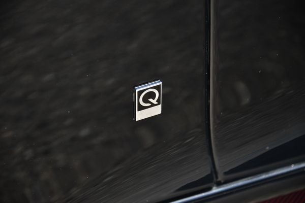 Black and red 2015 Aston Martin Vanquish Q Collection for sale by Sandbox Motors.