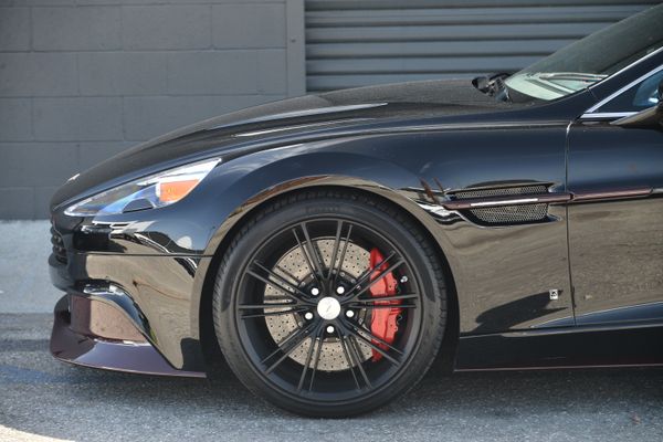 Black and red 2015 Aston Martin Vanquish Q Collection for sale by Sandbox Motors.