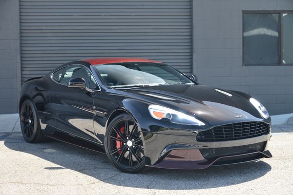 Black and red 2015 Aston Martin Vanquish Q Collection for sale by Sandbox Motors.