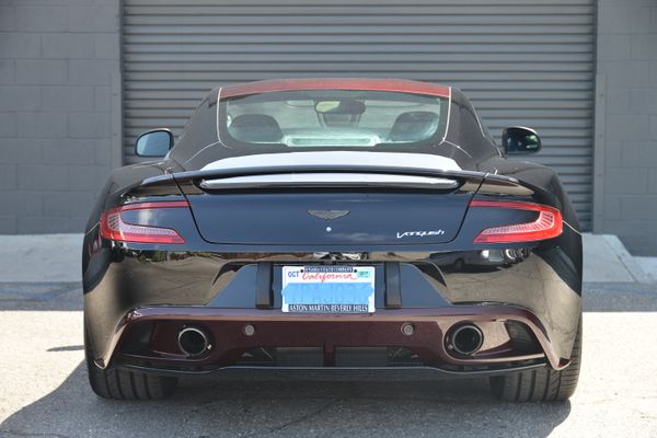 Black and red 2015 Aston Martin Vanquish Q Collection for sale by Sandbox Motors.