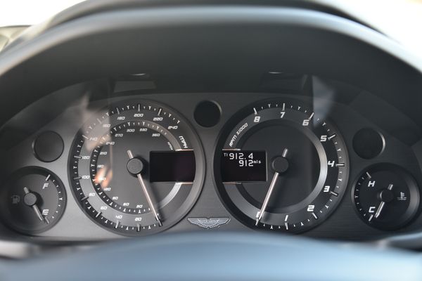 Black and red 2015 Aston Martin Vanquish Q Collection for sale by Sandbox Motors.