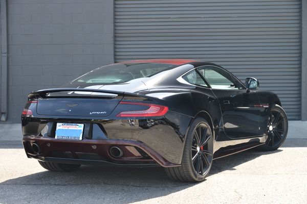Black and red 2015 Aston Martin Vanquish Q Collection for sale by Sandbox Motors.