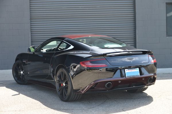 Black and red 2015 Aston Martin Vanquish Q Collection for sale by Sandbox Motors.