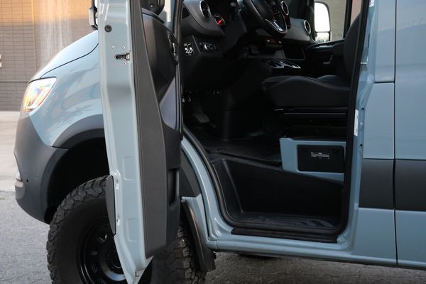 Silver 2022 Mercedes-Benz Sprinter 2500 4x4 custom camper conversion for sale by Sandbox Motors.