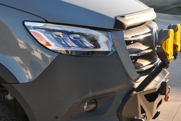 Silver 2022 Mercedes-Benz Sprinter 2500 4x4 custom camper conversion for sale by Sandbox Motors.