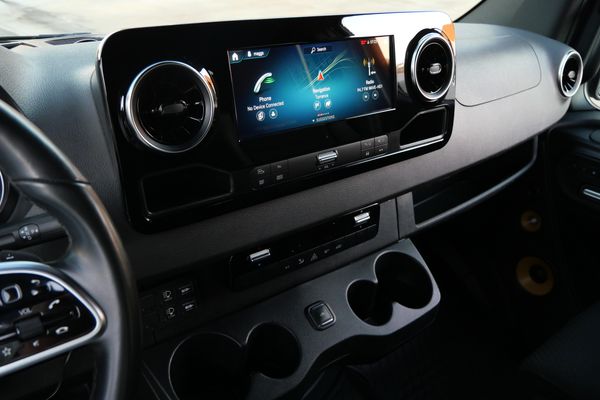 Silver 2022 Mercedes-Benz Sprinter 2500 4x4 custom camper conversion for sale by Sandbox Motors.