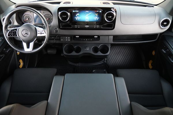 Silver 2022 Mercedes-Benz Sprinter 2500 4x4 custom camper conversion for sale by Sandbox Motors.