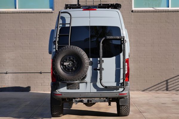 Silver 2022 Mercedes-Benz Sprinter 2500 4x4 custom camper conversion for sale by Sandbox Motors.