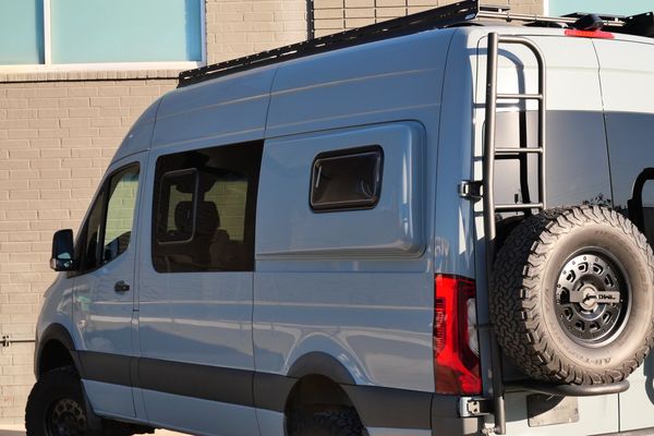 Silver 2022 Mercedes-Benz Sprinter 2500 4x4 custom camper conversion for sale by Sandbox Motors.
