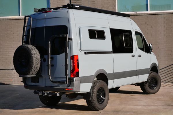 Silver 2022 Mercedes-Benz Sprinter 2500 4x4 custom camper conversion for sale by Sandbox Motors.