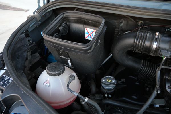 Silver 2022 Mercedes-Benz Sprinter 2500 4x4 custom camper conversion for sale by Sandbox Motors.