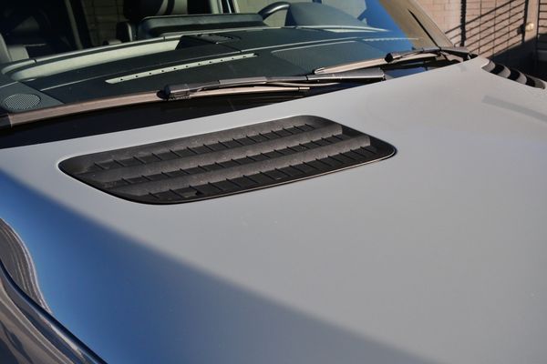 Silver 2022 Mercedes-Benz Sprinter 2500 4x4 custom camper conversion for sale by Sandbox Motors.