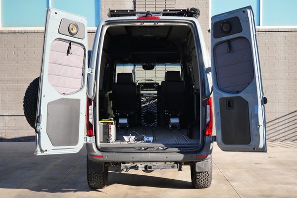 Silver 2022 Mercedes-Benz Sprinter 2500 4x4 custom camper conversion for sale by Sandbox Motors.