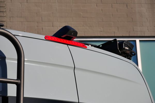 Silver 2022 Mercedes-Benz Sprinter 2500 4x4 custom camper conversion for sale by Sandbox Motors.