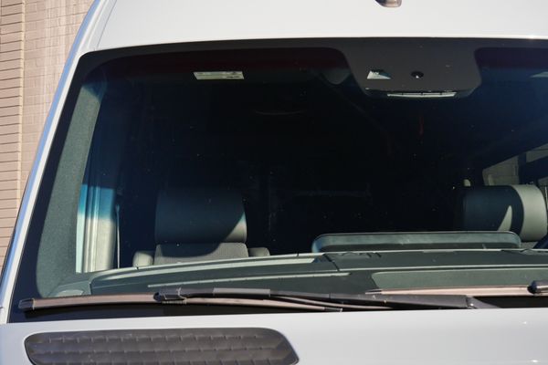 Silver 2022 Mercedes-Benz Sprinter 2500 4x4 custom camper conversion for sale by Sandbox Motors.