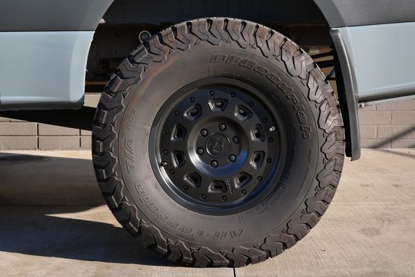 Silver 2022 Mercedes-Benz Sprinter 2500 4x4 custom camper conversion for sale by Sandbox Motors.