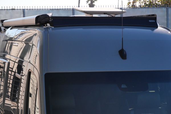 Silver 2022 Mercedes-Benz Sprinter 2500 4x4 custom camper conversion for sale by Sandbox Motors.