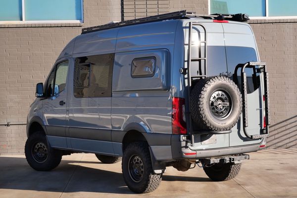 Silver 2022 Mercedes-Benz Sprinter 2500 4x4 custom camper conversion for sale by Sandbox Motors.