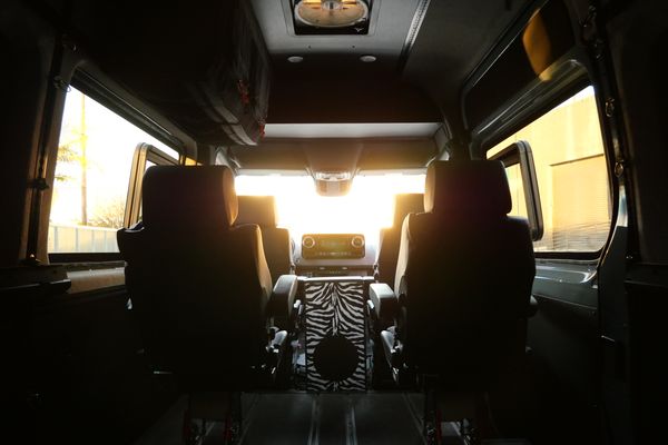 Silver 2022 Mercedes-Benz Sprinter 2500 4x4 custom camper conversion for sale by Sandbox Motors.