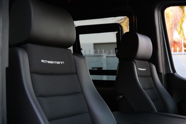 Silver 2022 Mercedes-Benz Sprinter 2500 4x4 custom camper conversion for sale by Sandbox Motors.