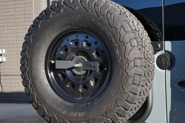 Silver 2022 Mercedes-Benz Sprinter 2500 4x4 custom camper conversion for sale by Sandbox Motors.